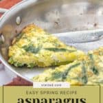 Slices of asparagus frittata in a metal pan with asparagus spears in the background. Text reads: "Easy Spring Recipe - Asparagus Frittata.
